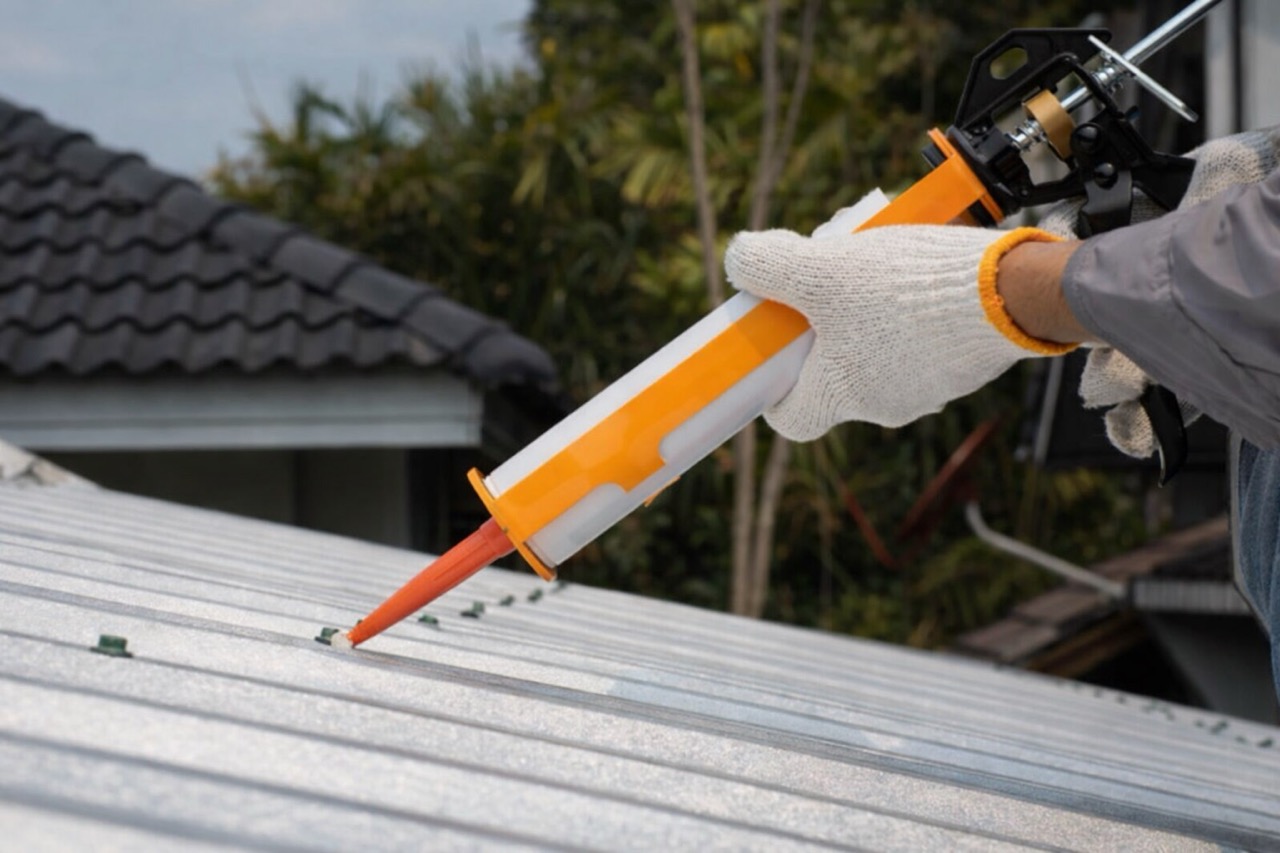 Applying sealant to a metal roof